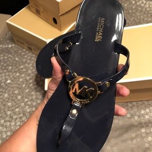 Michael Kors dark navy jelly sandals with gold